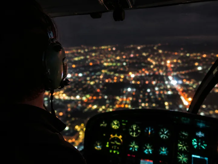 City lights seen from a helicopter at night