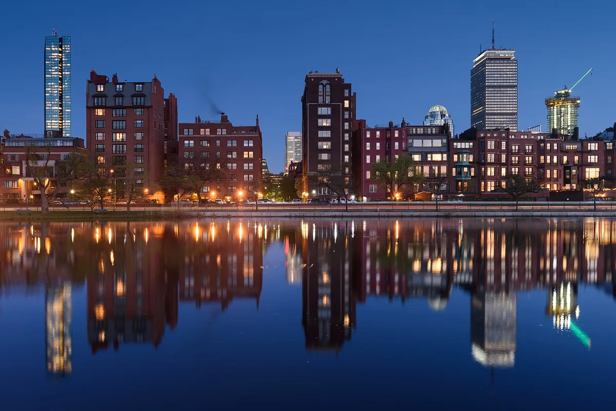 Back Bay towers in Boston reflected in Storrow Lagoon at blue hour