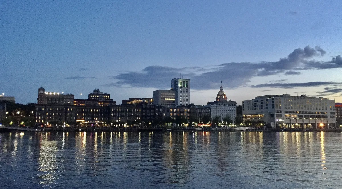 Downtown Savannah's waterfront across the Savannah River at dusk