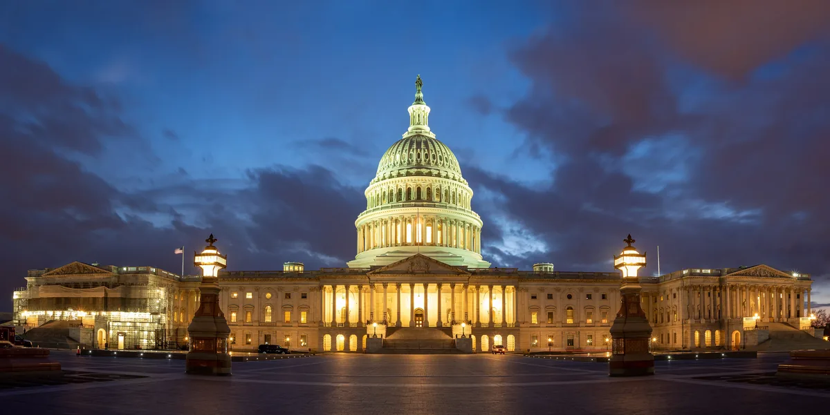 The east front of the US Capitol in Washington, DC, lit at dusk