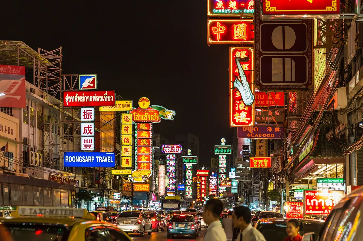 Neon signs over Yaowarat Road in Bangkok's Chinatown at night